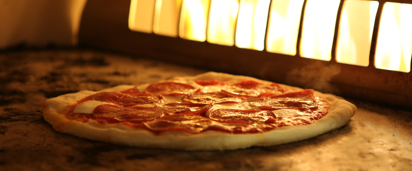 sortino's pizza cooking in the oven